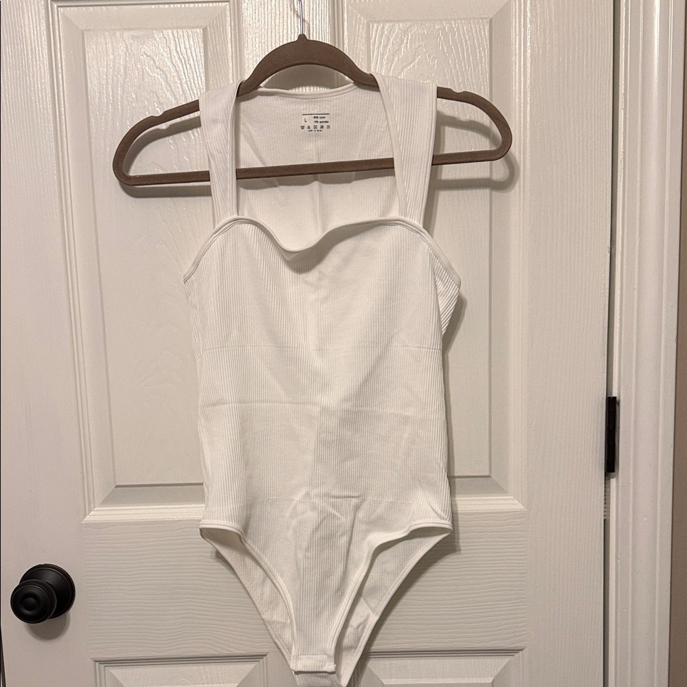 White Women’s One Piece Bodysuit Never Worn Just Doesn’t Have Tags